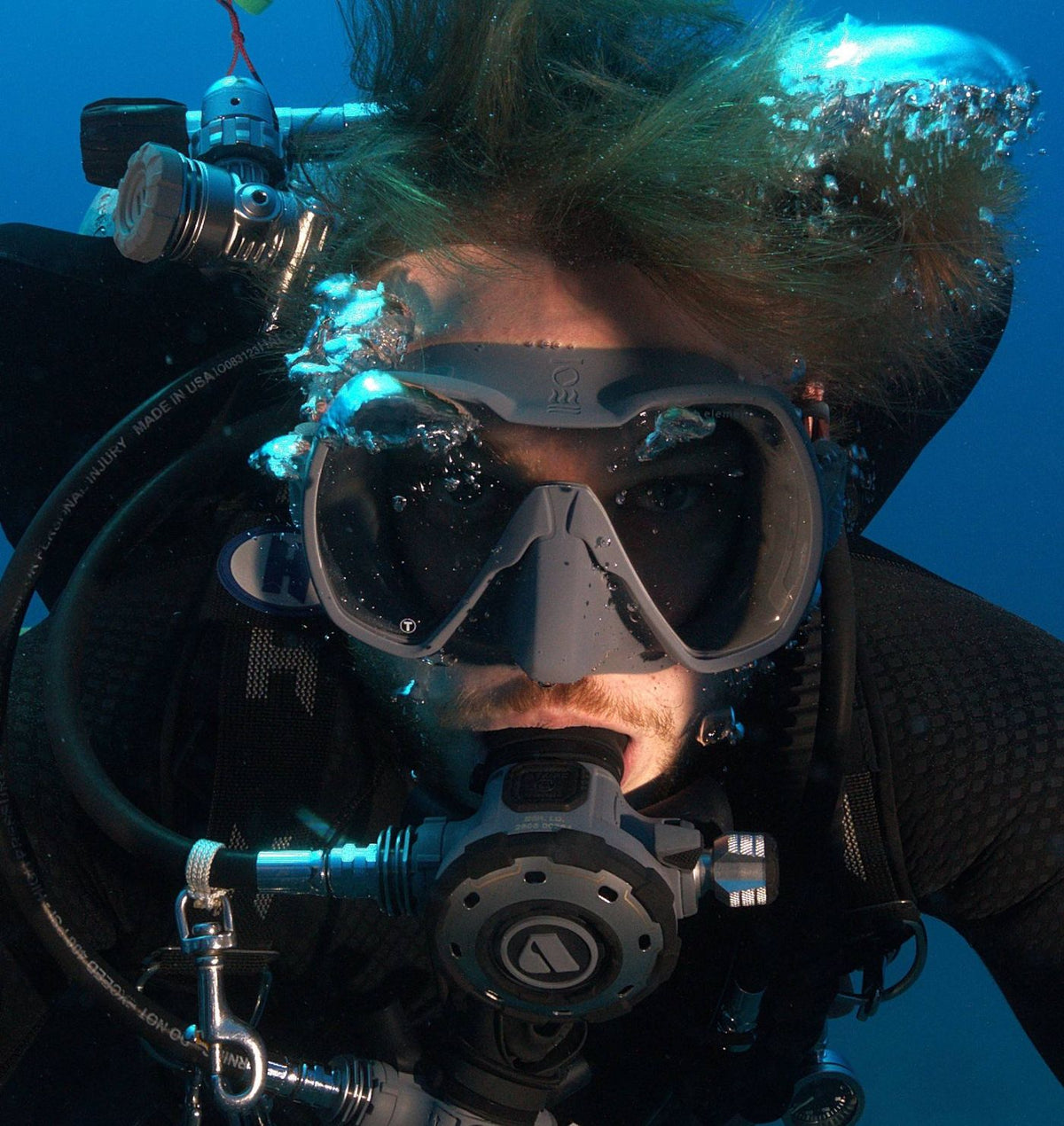 Diver close up with mask and regulator on